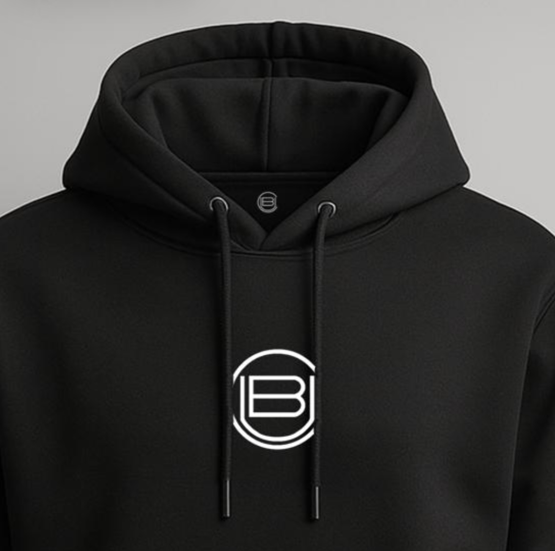 Sudadera Conquense Negra - Detalle del escudo